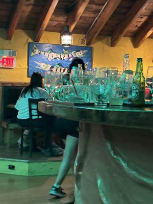 Easily had to be close to 30 glasses on this bar...when the restaurant had a total of 3 tables.