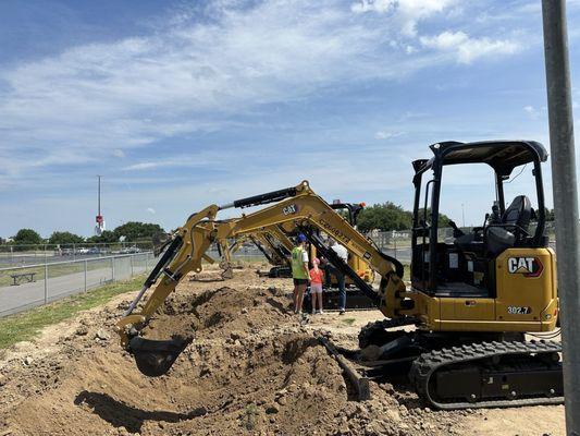 Excavator. With general admission, you can play with the scooping feature. It's timed, but you can go on again and again