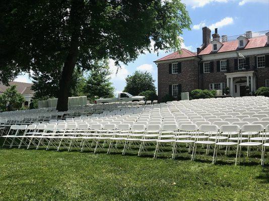 SFM team puts the finishing touches on preparation for a graduation ceremony.