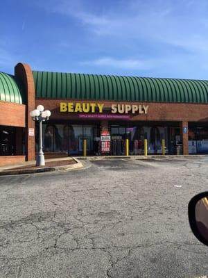 Store front. In the shopping center with Little Caesar's.