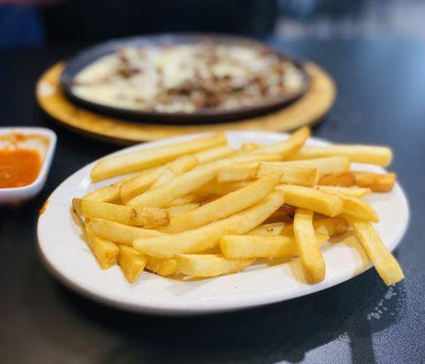 Steak Flambé comes w/ Perfect French fries every time! We LOVE this dish. YUM YUM YUM :)....