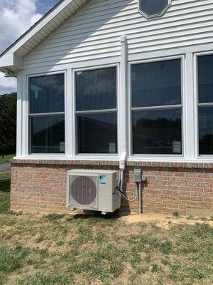 Mini-Split Condenser installed to make a sunroom comfortable for all seasons