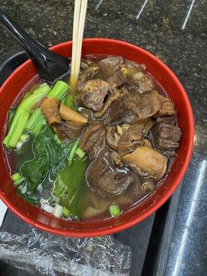 Beef brisket and tendon with flat noodles soup