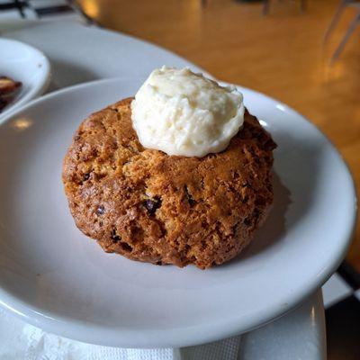 Warmed Chocolate chip biscuit,  topped with butter