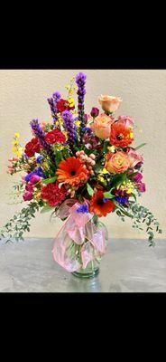 Bright and cheery mixed floral arrangement