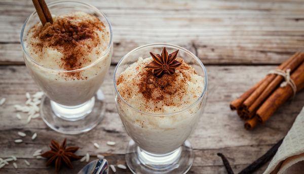 Arroz con dulce. The consistency is thicker, almost like a cake. Made with coconut milk, rice, raisins, cinnamon and spices.