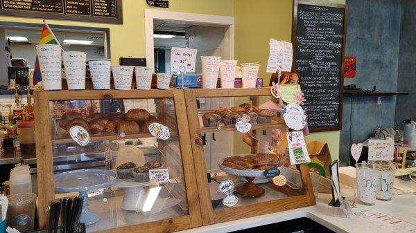 Fresh baked pastries and the wall menu.