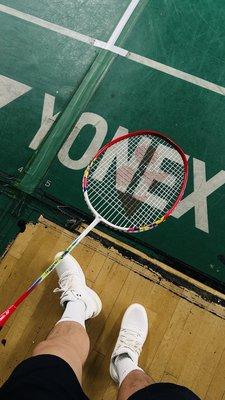 Yonex logo on court