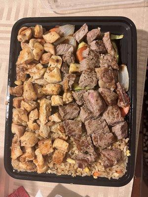 New York steak and chicken with rice and veggies