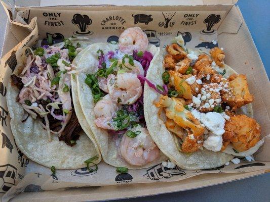 Beef brisket, cilantro lime shrimp, and buffalo cauliflower tacos