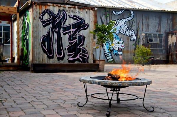 Chinese Character for "monkey" and famous Chinese White Tiger "bak fu" around the fire pit