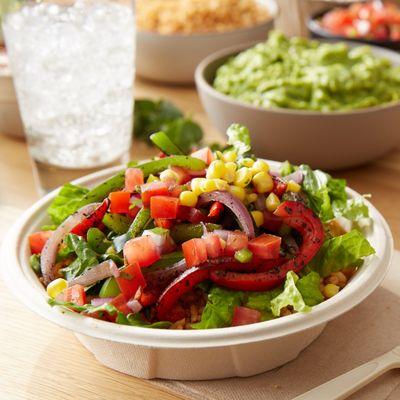 Salads are made with crisp romaine and can be topped with fresh ingredients like flame-grilled fajita vegetables, freshly-mad...