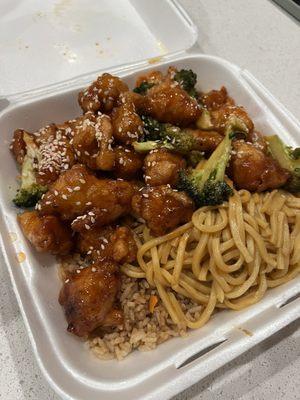 Sesame chicken with pork fried rice and lo mein noodles.