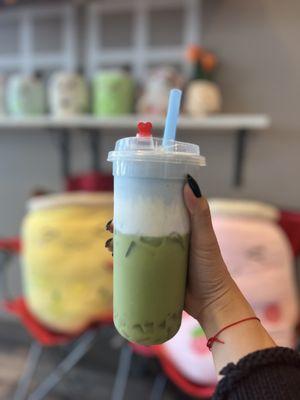 Ocean Breeze: Matcha, coconut milk, pea flower foam at 75% sweetness and less ice. Added aloe.