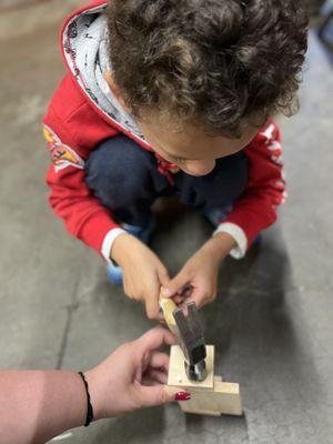 Working on his Workshop project!