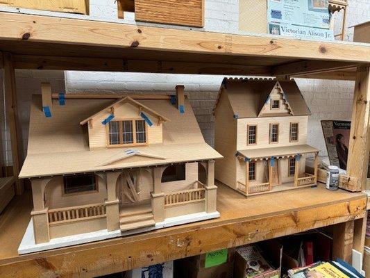 Pre-built and in the box doll houses.