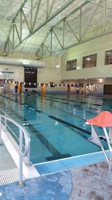 Swim pool with lap lanes and diving board.