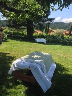 Out call massage treatments in backyard of vacation house.