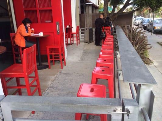 Outdoor sidewalk seating.