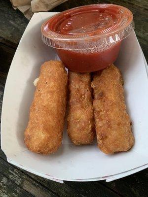 Giant mozzarella sticks, six per serving.