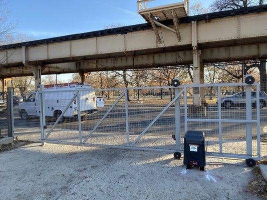 Slide gate system to match pedestrian gate for business