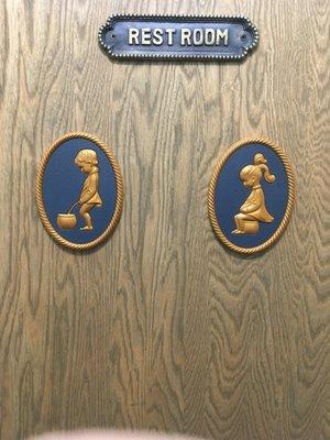 Hilarious plaques on restroom door ROFL.