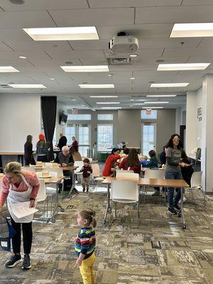 One of the large classrooms being used for Gingerbread House making.