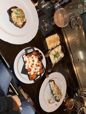 Filet , rib eye , blue cheese crust, sweet potato tots with marshmallow, potatoe puree, army and navy drink, Truffle Mac and Cheese