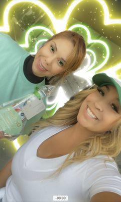 Marisella & Lisa sharing goodie bags on St. Patty's Day!