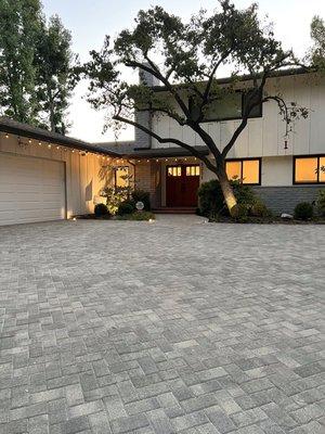 Pavingstone driveway with accent lighting.