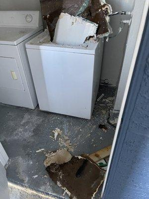 Damaged laundry room that was like this for 2 months and no reimbursement for laundry expenses.