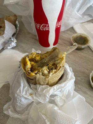 Breakfast burrito with plastic inside