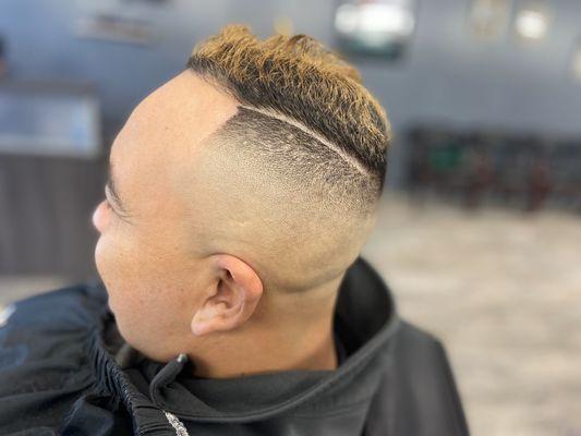 High skin fade with part