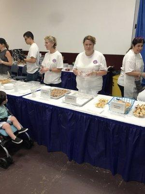 Happy Greeks ready to serve baked goods! #Opa