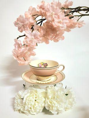 A timeless tea cup and saucer set from the Vintage Place Settings' pink collection.