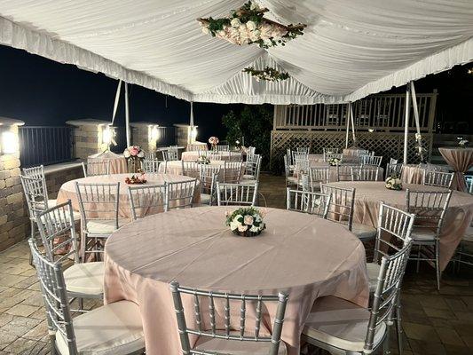 15x30 tent with liner, flower chandelier and table set up