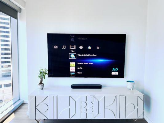 TV mounting with concealment in the wall