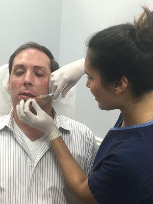 Sarah Sadiq, PA doing lip filler injections.