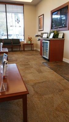 Flat screen TV & water bottle fridge - nice!