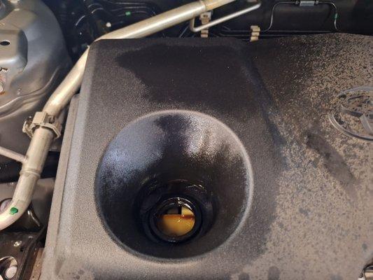 Oil all over engine due to missing oil cap