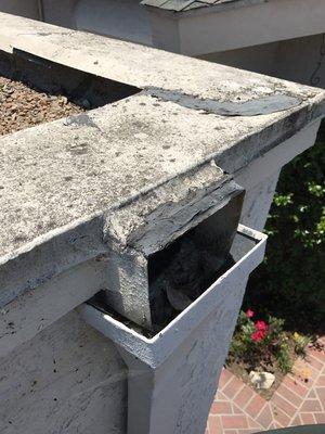 Scupper drain repair on flat rock roof in Laguna Niguel, CA