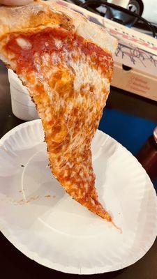 Slice of NY-style thin crust, perfect crust