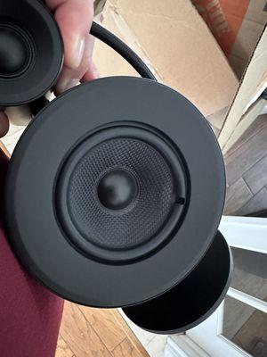 Punctured speaker thrown in box with sharp objects. Not wrapped