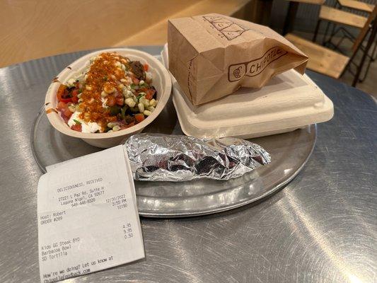 Burrito Bowl with Barbacoa, black beans, pinto beans, white rice, brown rice, a tortilla on the side, and a build your own BYO meal.