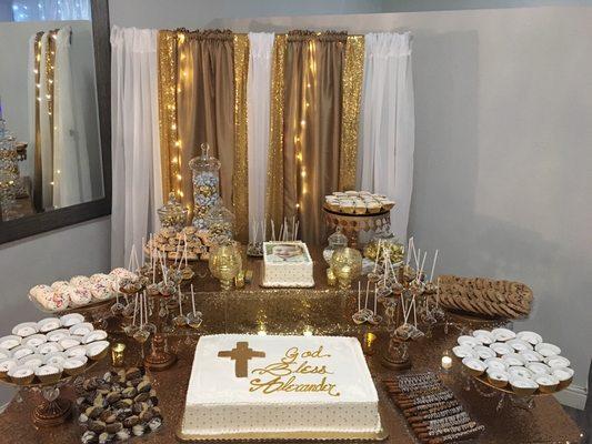 Assorted dipped and drizzled dessert buffet and backdrop decor