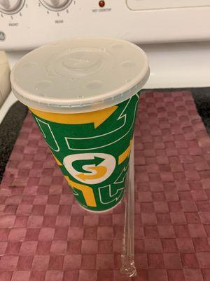 Sprite Soft Drink with straw.