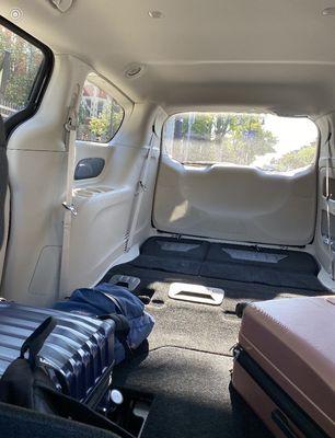 Spacious back of the Chrysler Voyager with the seats hidden in the floor!