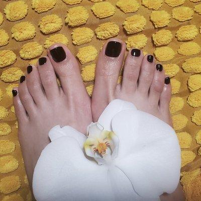 Dark burgundy polished Spa pedicure