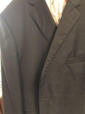 Suit returned from Ace Cleaners with absolutely shocking results!