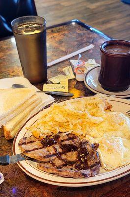 10/2/23  Steak and eggs little splash A1 eggs over medium white toast hash browns lightly done. Cawfee